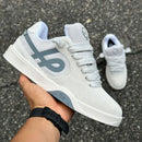 Tênis ous imigrante serie x concreto reflex essencial